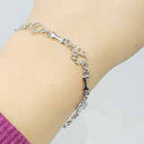 Exklusive Edition - Armband mit silbernen Hundepfoten- und Knochenanhängern