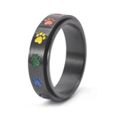 Rotierender Stressabbau-Ring mit Regenbogenpfoten – Edelstahl