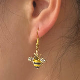 Kristallohrringe in Gold mit Bienen- und Honigwaben-Motiv
