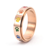 Rotierender Stressabbau-Ring mit Regenbogenpfoten – Edelstahl